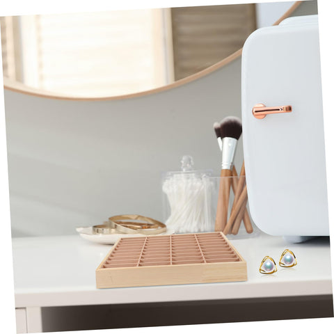 Slick Multi Grid Jewelry Tray Wooden Desktop Organizer Phone Stand For Rings Earrings And Bracelets Elegant Catch All Station on a vanity.