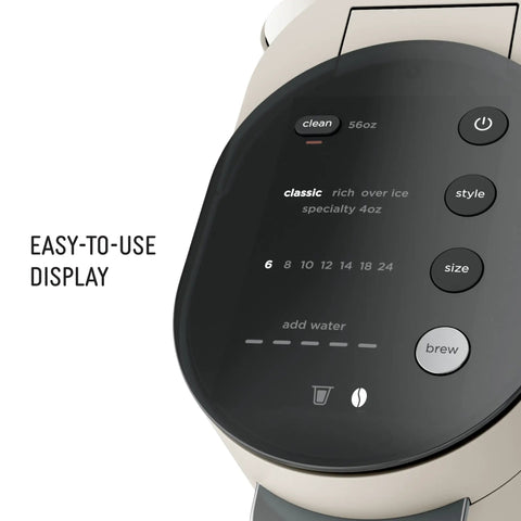Display panel of Pod and Grounds Single Serve Coffee Maker With Built In Milk Frother 56 Oz Reservoir showing brew options.
