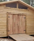 Wooden shed with double doors using 8 Inch T Strap Barn Door Hinges Heavy Duty Gate Hinge Set Black Wrought Iron Rustproof 6 Pcs.