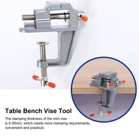 Hella Sturdy Mini Bench Vise For Snappy 0 To 35 Mm Clamping with steel jaws, mounted on table for secure wood clamping.