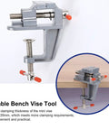 Rock Solid Mini Bench Vise, Clamp On Table Workstation Setup, heavy-duty steel jaws, meets 0-35mm clamping needs.