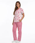 Hot Pink Scrubs Tops And Pants Set For Women Perfect For Nurses Veterinary Techs Dental Hygienists And Pet Groomers With Handy Pockets And All Day Comfort Workwear For Hospitals And Clinics, shown on woman