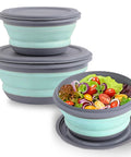 Collapsible Silicone Bowls Set Of 3 With Lids BPA Free Food Grade Camping Dinnerware In blue filled with salad, stacked view.
