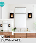 Bathroom scene with set of two farmhouse wall sconces with modern industrial vibe, matte black finish and faux wood backing.