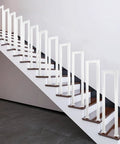 Heavy Duty Side Mount Stair Rail With Rock Solid Grip For Deck Balusters And Outdoor Steps Easy Peasy Install No Sweat Setup Built Tough As Nails Ideal Grip For Seniors And Kids All Weather Durable on white stairway.