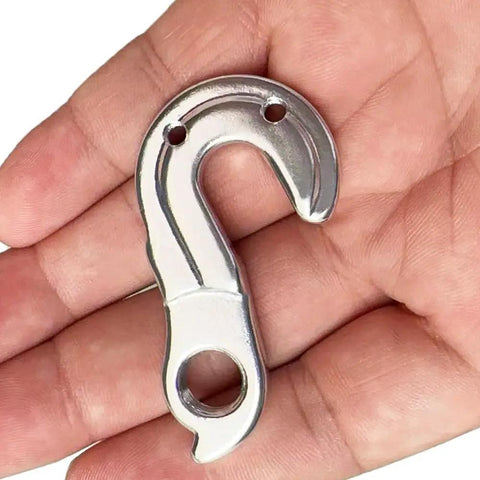 CNC machined aluminum Derailleur Hanger 217 Replacement for Diamondback and Raleigh mountain bikes in hand