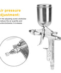 Close-up of Compact Pneumatic Spray Gun With Tight 0.5mm Nozzle And 125ml Gravity Cup showing air pressure adjustment feature.