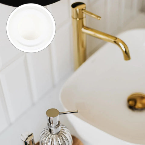 Close-up of 4 Pcs Silicone Bathtub Stopper White Flat Cover in bathroom sink with gold faucet.