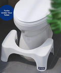 White plastic Squatty Potty Simple Curve 7-inch toilet stool beside white toilet