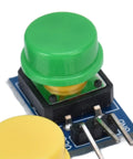 Close-up of green tactile button switch on a PCB, part of the 5 Piece Button Switch Module Large Push Button Board With Tactile Keys And Color Covers Perfect For Sensor Expansion Boards And Smooth Circuit Building Sets Straight Up Dead Simple Wiring No Sweat Assembly Badass Quality.