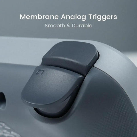 Close-up of membrane analog triggers on the Retro 90s Themed Wired Game Controller For Switch Android iOS PC Steam
