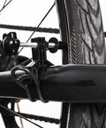 Close-up of Portable Bike Wheel Truing Stand For Front And Rear Rims Rim Adjustment Tool Lightweight Compact with black mount