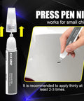 Close-up of a person using the Mercedes-Benz Alpine Grey 956 Touch Up Paint Kit With 2 In 1 Scratch Repair Pen And Brush for small chip repair.