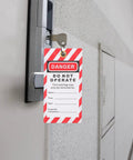 Industrial Safety Lockout Tags With Hanging Labels Kit on door lock for equipment repair with bold warning signs