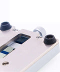 Close-up of Pro Grade Multifunctional Phone Repair Jig Clamp Fixture With Fixed Rotary Holder showing adjustable metal frame and knobs.