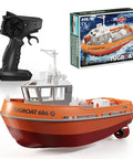 One Seventy Two Scale Proportional RC Tugboat for Pools and Lakes, Two Point Four GHz High Speed RC Boat With Dual Motors, LED Navigation Lights, Low Battery Alarm, Durable Water Toy in Red Perfect Gift for Weekend Pool Parties and Lakeside Adventures next to remote control and box