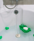 Solid 2 Pack Rubber Tub Stopper With Long Stainless Steel Beaded Chain And Heavy Duty Drain Plug For 1.5 To 2 Inch Bathroom Kitchen And Laundry Sink Drains with green frog design in bathtub.