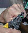 Using 6 Piece Basic Tool Set For Home And Pros With High Leverage 9 Inch Lineman's Pliers Angled Diagonal Cutters Wire Stripper And Cutter And Screwdrivers Ideal Apprentice DIY Project Kit For Quick Reliable Repairs wire stripper on green wire