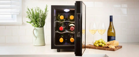 Six Bottle Wine Fridge With UV Protective Glass Door And Soft Interior Lighting Freestanding Beverage Cooler open on countertop