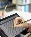 Hand using Plug And Play Digital Stylus Pen With Snug Hex Grip For Silky Smooth Writing On All Touchscreens with laptop.