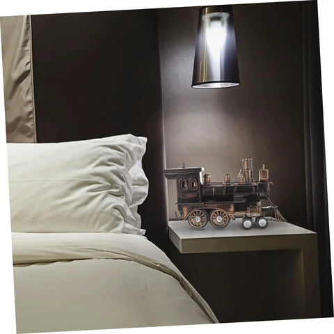 Locomotive Model Retro Steam Train Sculpture For Desktop Decoration on nightstand, under soft lighting