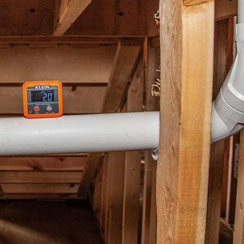 Digital Level And Angle Gauge Tool Kit With Magnetic Base And Plumbers Straps, Measures And Sets Angles, installed on pipe