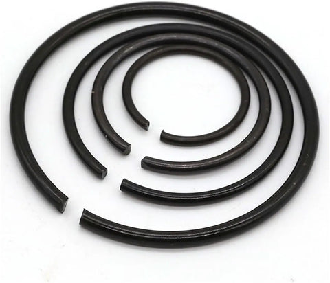 65 Count Heavy Duty Mn Steel Shaft Circlips For Axial Locking High Performance Retaining Rings arranged in various sizes on a white background.