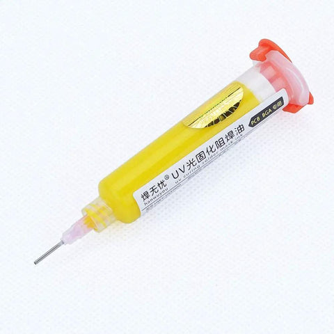 Yellow UV Soldering Paste Flux 10cc in syringe with push needle for PCB BGA Circuit Boards, ideal for precise repairs and rework.