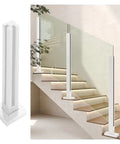 Stainless Steel Railing Kit For Indoor And Outdoor Decks Featuring Weatherproof White Baluster Panels on staircase with glass.