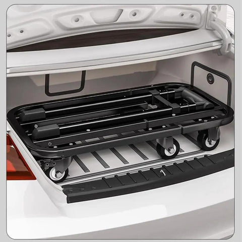 Smooth Rolling Folding Platform Trolley With Durable Steel Frame, Portable Flatbed Cart For No Sweat Household Hauling, Compact Utility Dolly For Garage Storage And Breezy Weekend Project Moving in a car trunk.