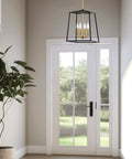 16 Inch 4 Light Modern Black Lantern Pendant Light With Warm Brass Accents Dope Geometric Metal Cage Chandelier in a foyer