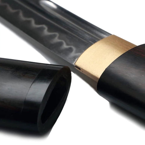 Close-up of Hand Forged Japanese Tanto Short Sword 15 Inch Tempered T10 Steel with Full Tang Ebony Wood Sheath and Bamboo Nail Accents.
