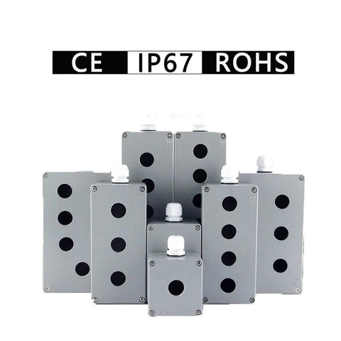 Six aluminium IP67 push-button control boxes with 22mm holes and white buttons
