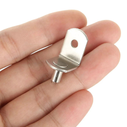 No Sweat 100 Pack Cabinet Shelf Pins With Cushioned Sleeves And Adjustable L Shaped Pegs For Kitchen Bookcase Furniture Fixes And Quick Room Organization Hacks In Silver held in a hand.