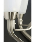 Close-up of bracket on Three Light Sleek Modern Bath Vanity Light With Etched Glass In Brushed Nickel Transitional Style Dimmable