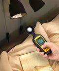 Digital Illuminance Meter Handheld Light Meter With Ambient Temperature Range 0 To 200000 Lux in use on a bed with lamp
