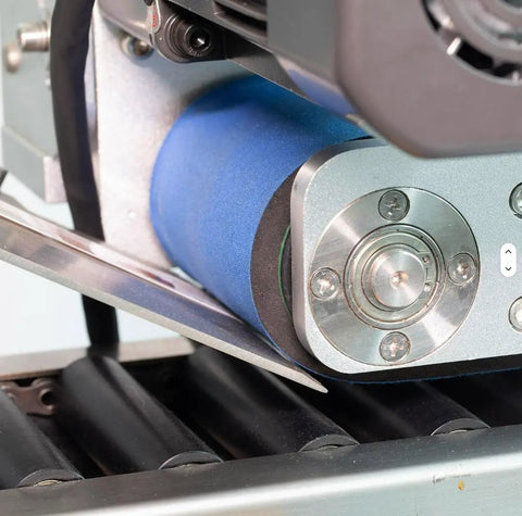 Automatic Horizontal Labeling Machine For Small Vials Bottles And Tubes Featuring Touch Screen Interface and Zero Hassle Automatic Functions showcasing inclined roller for steady label application.