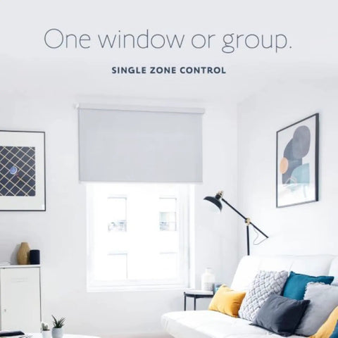 Living room with motorized shade controlled by Situo Pure II RTS Single Channel Remote Control For One Motorized Shade Or Gate.