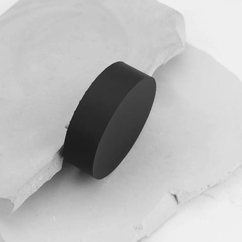 Side view of black rubber lift pad, part of the 2 Pack 48mm Rubber Jack Pads For 50mm Saddles And Most 2 Ton Jacks Thick 14mm.