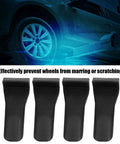 4 Pack Tire Changer Jaw Protectors Clamp Covers For Preventing Wheel Scratches And Damage Bent Angle Guard Shields Pro Grade Durable Composite Plastic For Safe Smooth Tire Service in composite plastic with black color.