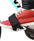 Close-up of a shoe on a pedal using 2 Pcs Black Bike Pedal Straps With Toe Clips For Fixed Gear Bikes and Standard Pedals