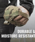 Person holding Support Bag For Shooting Rest Large Canister 500D Durable Construction Multicam Pattern with hand strap visible.