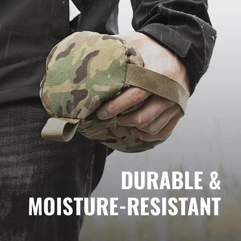 Person holding Support Bag For Shooting Rest Large Canister 500D Durable Construction Multicam Pattern with hand strap visible.