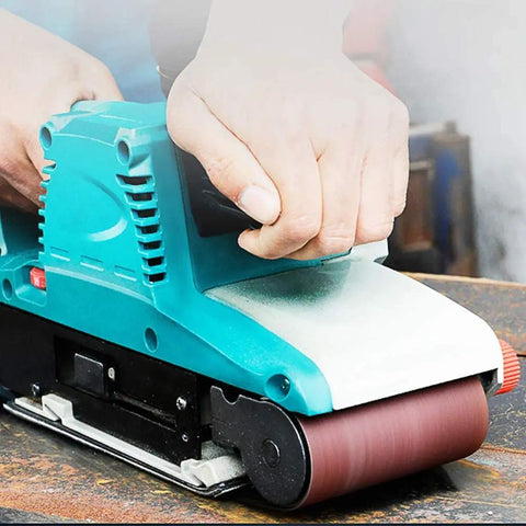 Person using 3X18 Inch Sanding Belt Set With 21 Belts Aluminum Oxide Paper For Sander on a woodworking project