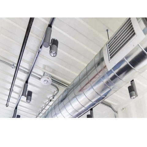 Carbon Monoxide Gas Transmitter With Display installed in HVAC duct system under ceiling.