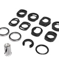 Complete Mountain Bike Headset Kit with CNC machined spacers, top and bottom covers, bearings, and fork expander plug on display.