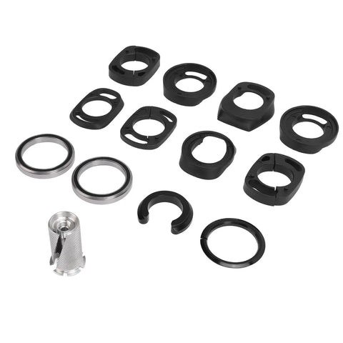 Complete Mountain Bike Headset Kit with CNC machined spacers, top and bottom covers, bearings, and fork expander plug on display.
