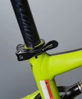 34.9mm Adjustable Bicycle Seatpost Clamp with Quick Release Aluminum Alloy Build on a bright green bike frame
