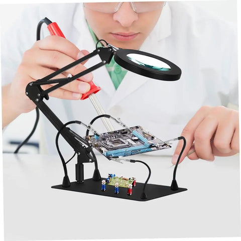 Technician using Five Piece Third Hand Soldering Tool Set with Gooseneck Arm and Rotating Clips for PCB repair.