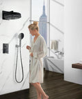 Woman using the Shower System, 2-Function Concealed Set with Solid Brass Control Valve in a modern bathroom.